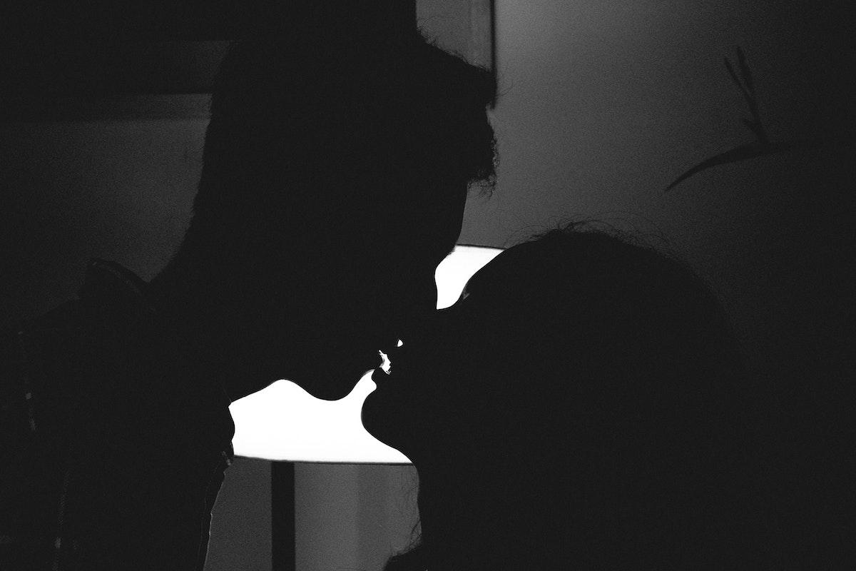 intimacy man and woman kissing