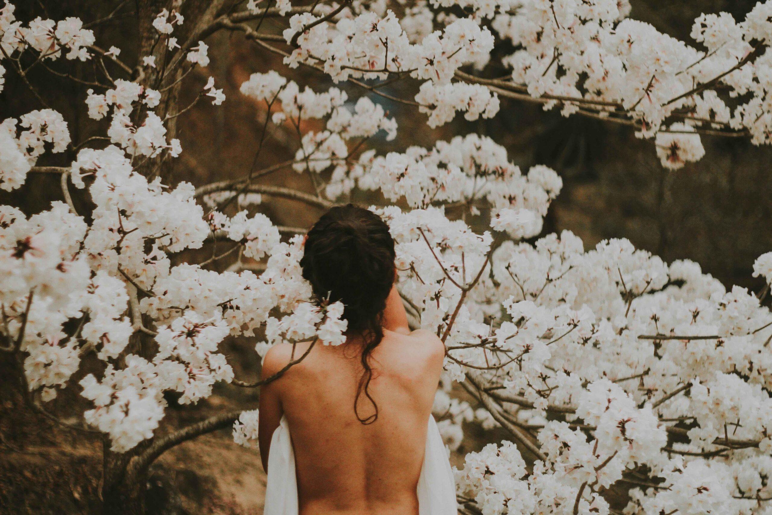 woman among white flowers