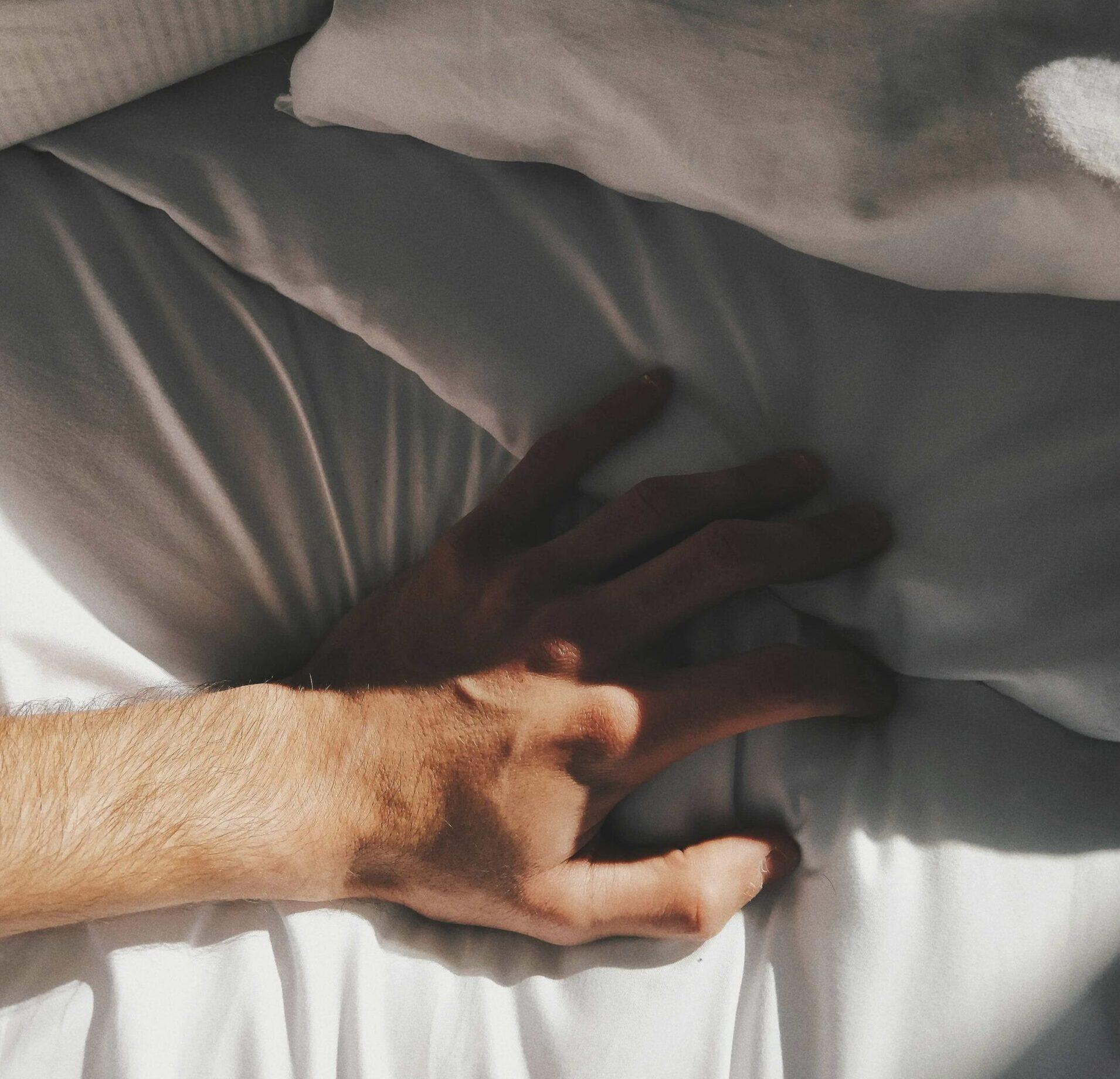 hand in bed