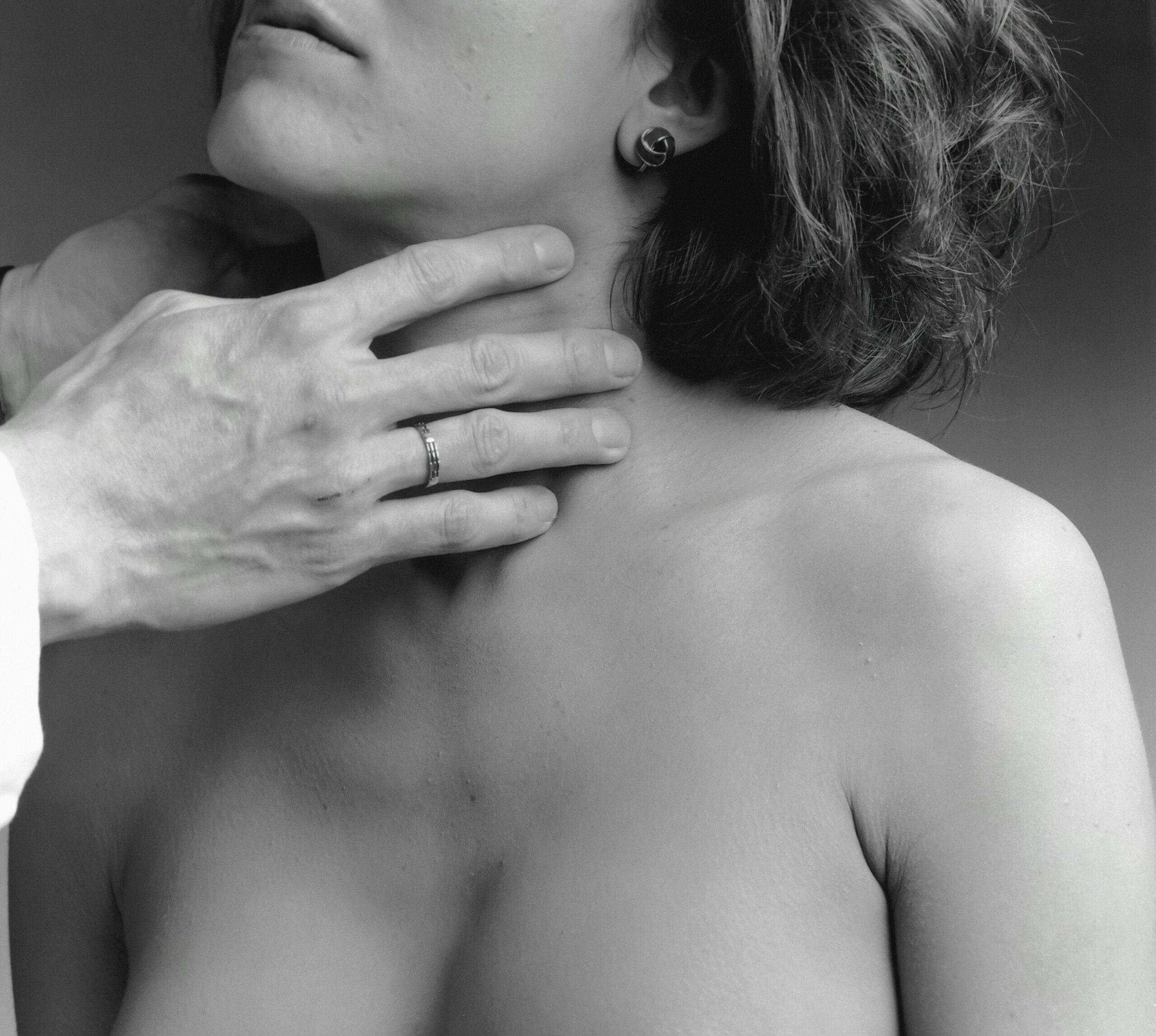 hand on neck